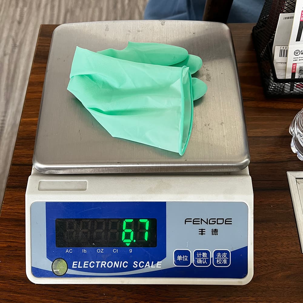 Green Latex Gloves with Aloe Vera Disposable - Image 3