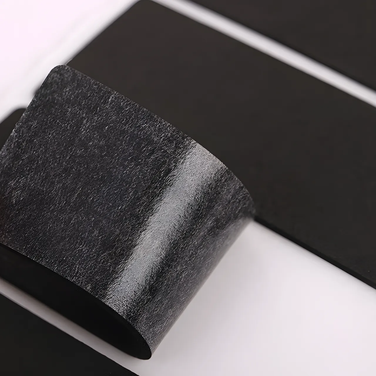 EVA foam sheet with adhesive backing applied